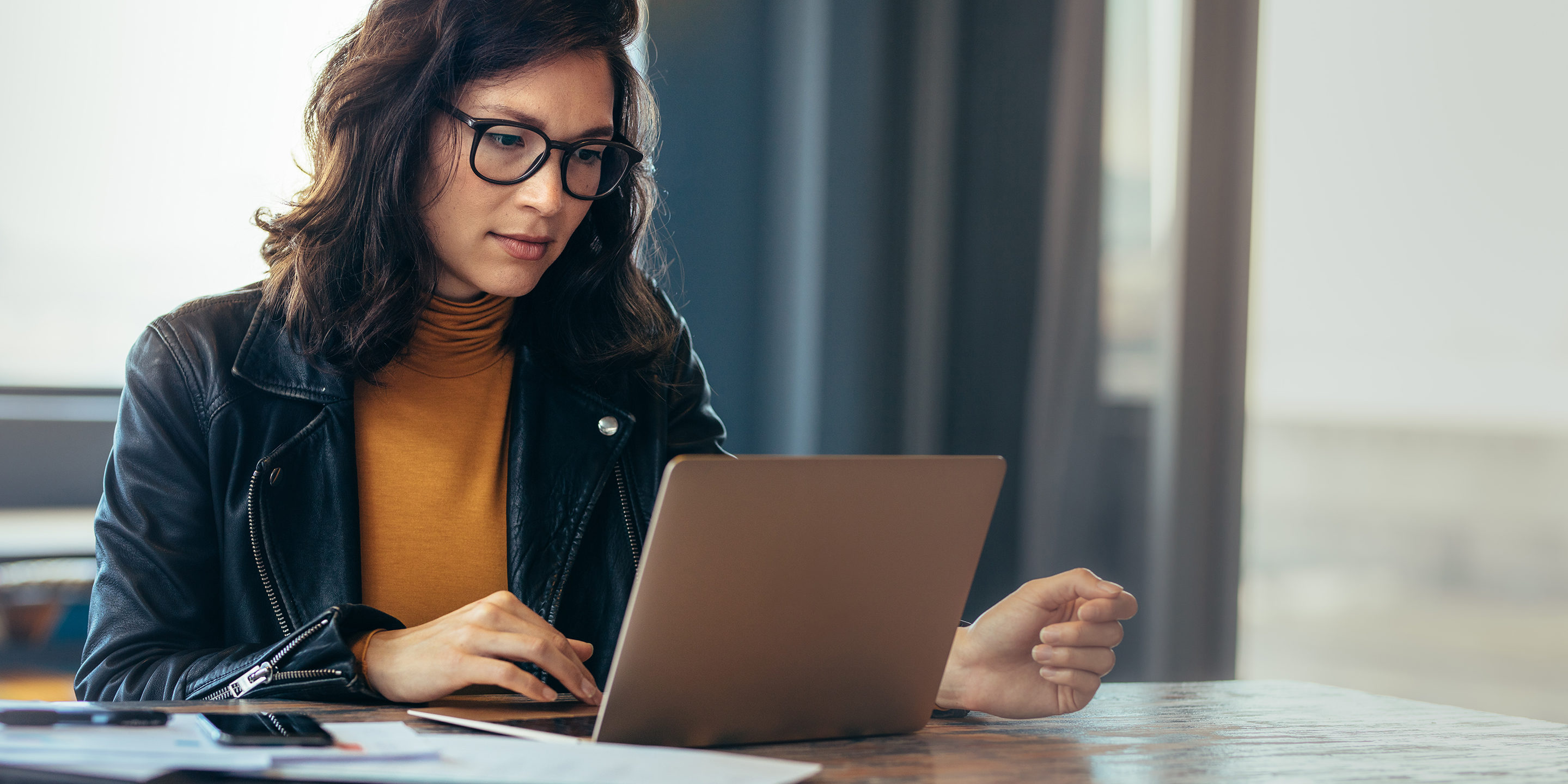 Asian woman working laptop at office